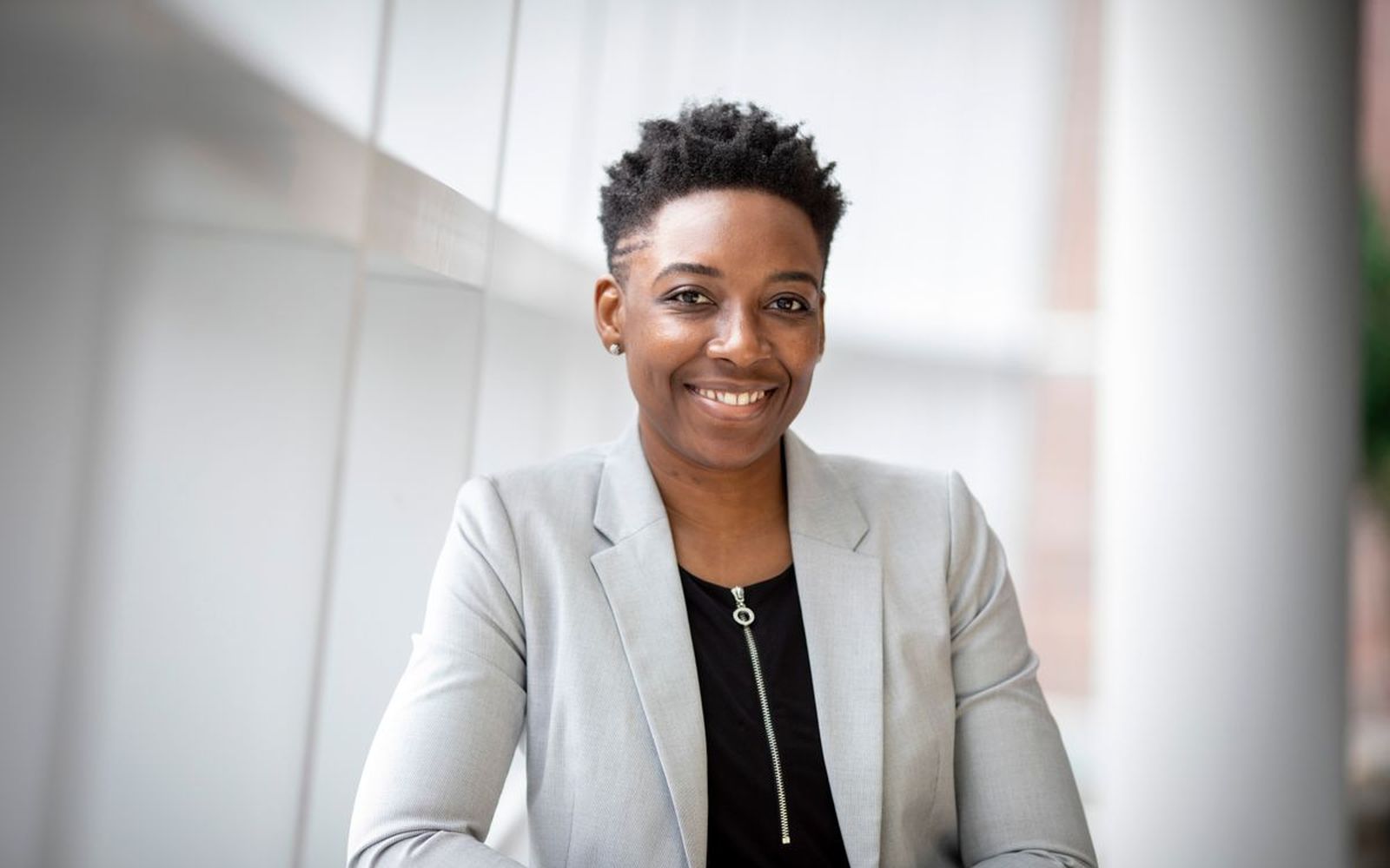 A certified professional in a bright modern office